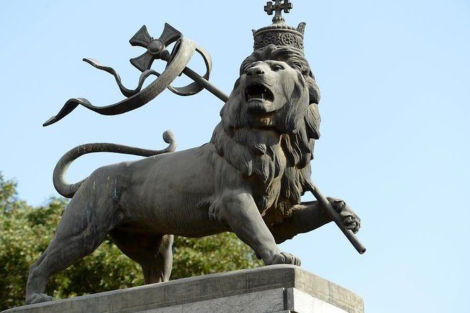 The bronze Lion of Judah monument in Addis Ababa, a crowned lion carrying a cross-topped staff